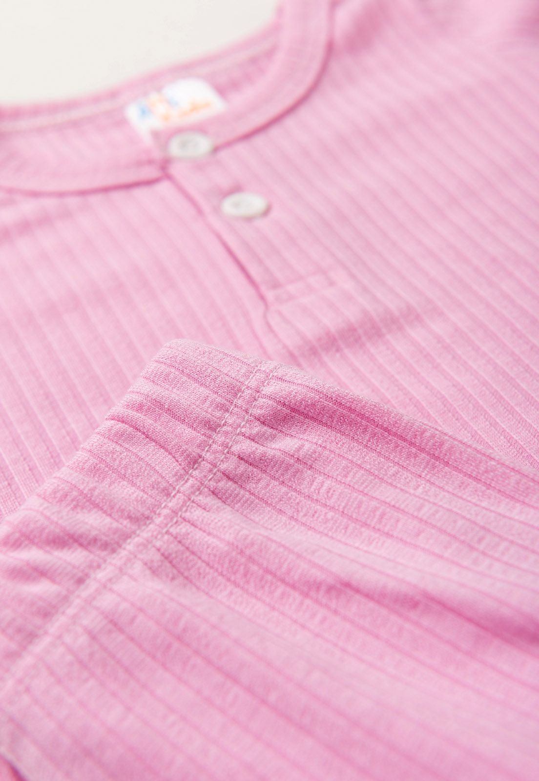 Detalhe: Textura canelada do Conjunto Blusa e Cal&ccedil;a Canelado Ame Kids, cor Rosa