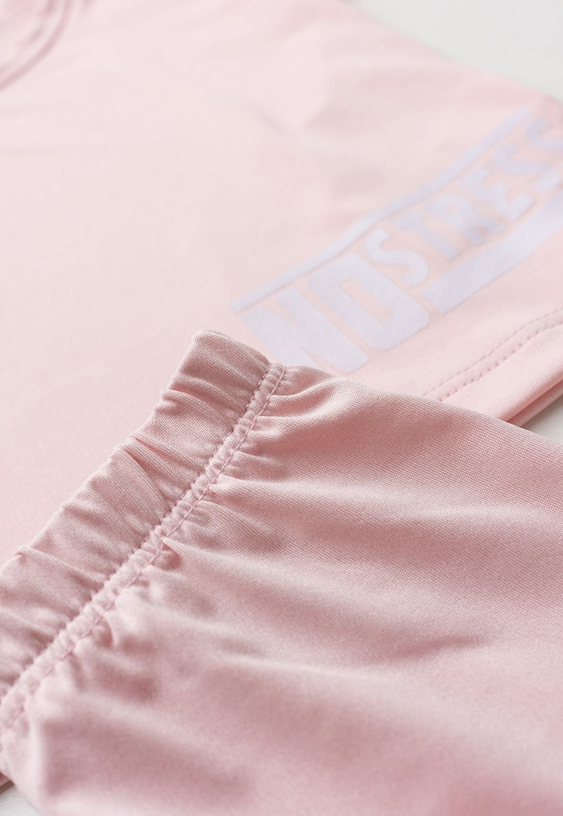Detalhe: C&oacute;s com el&aacute;stico do Conjunto Blusa e Shorts com Prote&ccedil;&atilde;o UV Ame Kids, cor Rosa Beb&ecirc;