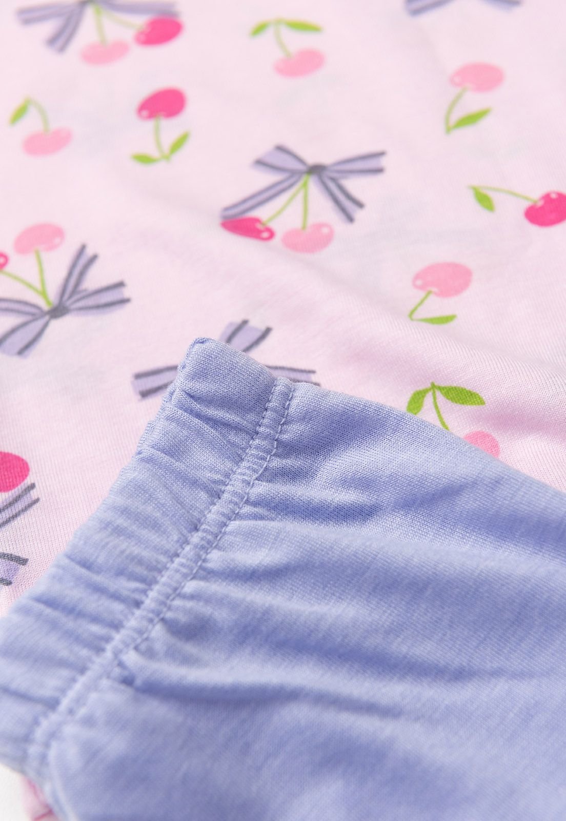 Detalhe: C&oacute;s com el&aacute;stico do Conjunto Pijama Blusa e Shorts Ame Kids, cor Rosa