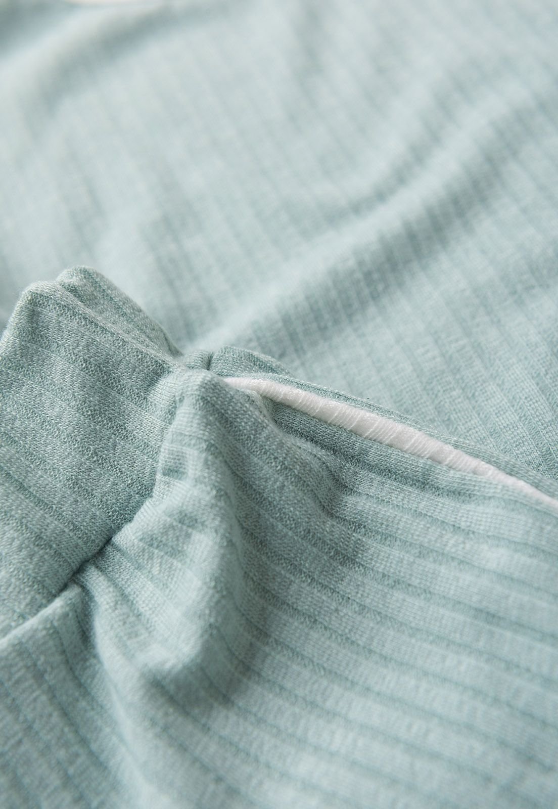 Detalhe: Vi&eacute;s contrastante do Conjunto Blusa e Cal&ccedil;a Canelado Ame Kids, cor Verde