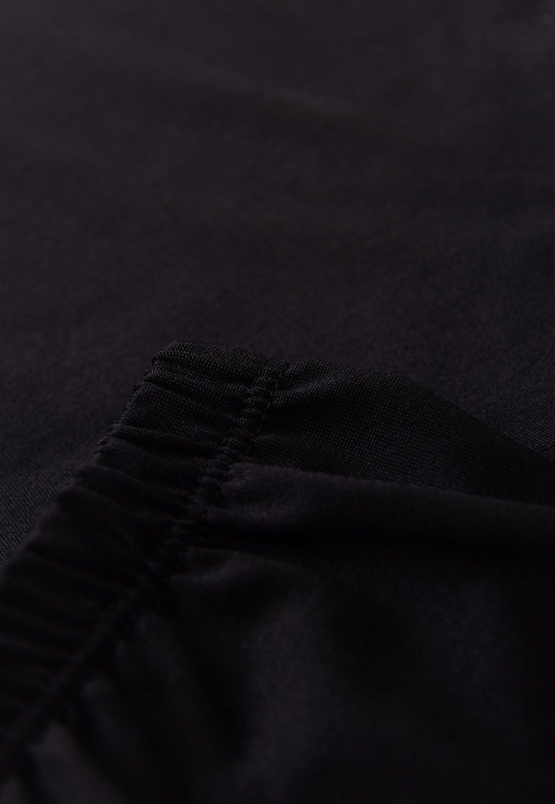 Detalhe: C&oacute;s com el&aacute;stico do Conjunto Blusa e Cal&ccedil;a T&eacute;rmica Ame Kids, cor Preto
