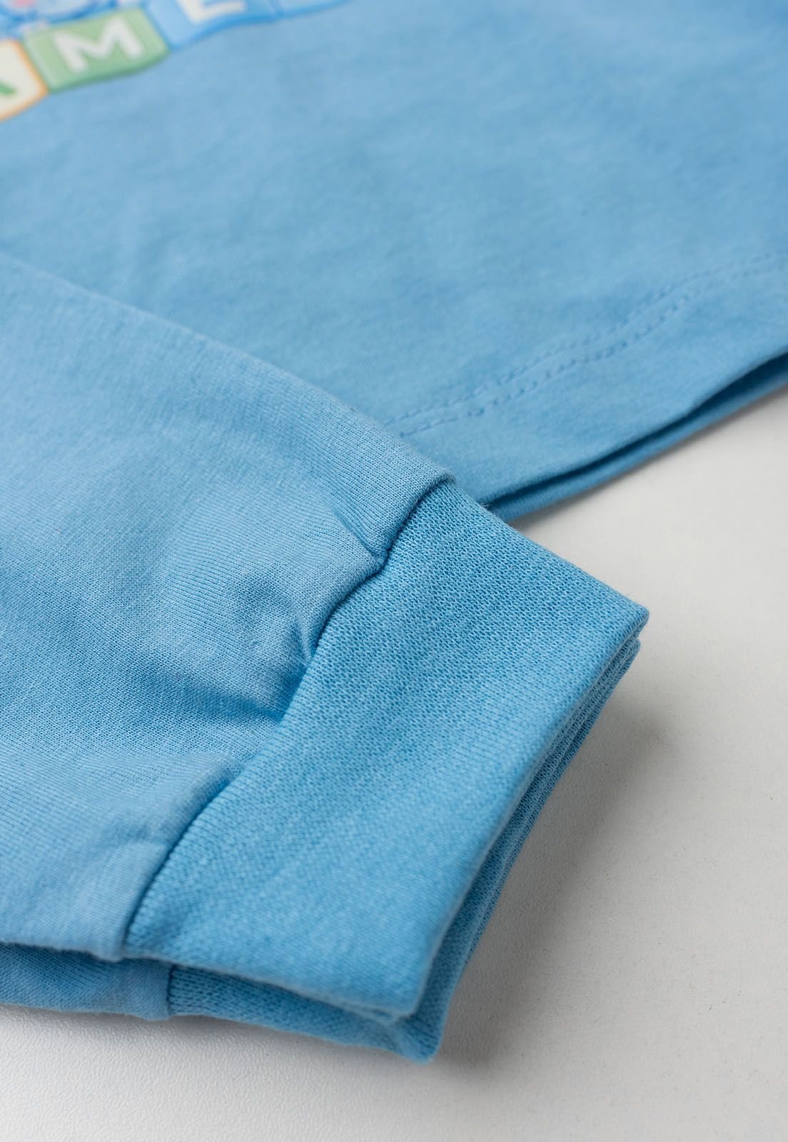 Detalhe: Punhos em ribana do Pijama Blusa e Cal&ccedil;a Estampado Ame Kids, cor Azul Beb&ecirc;