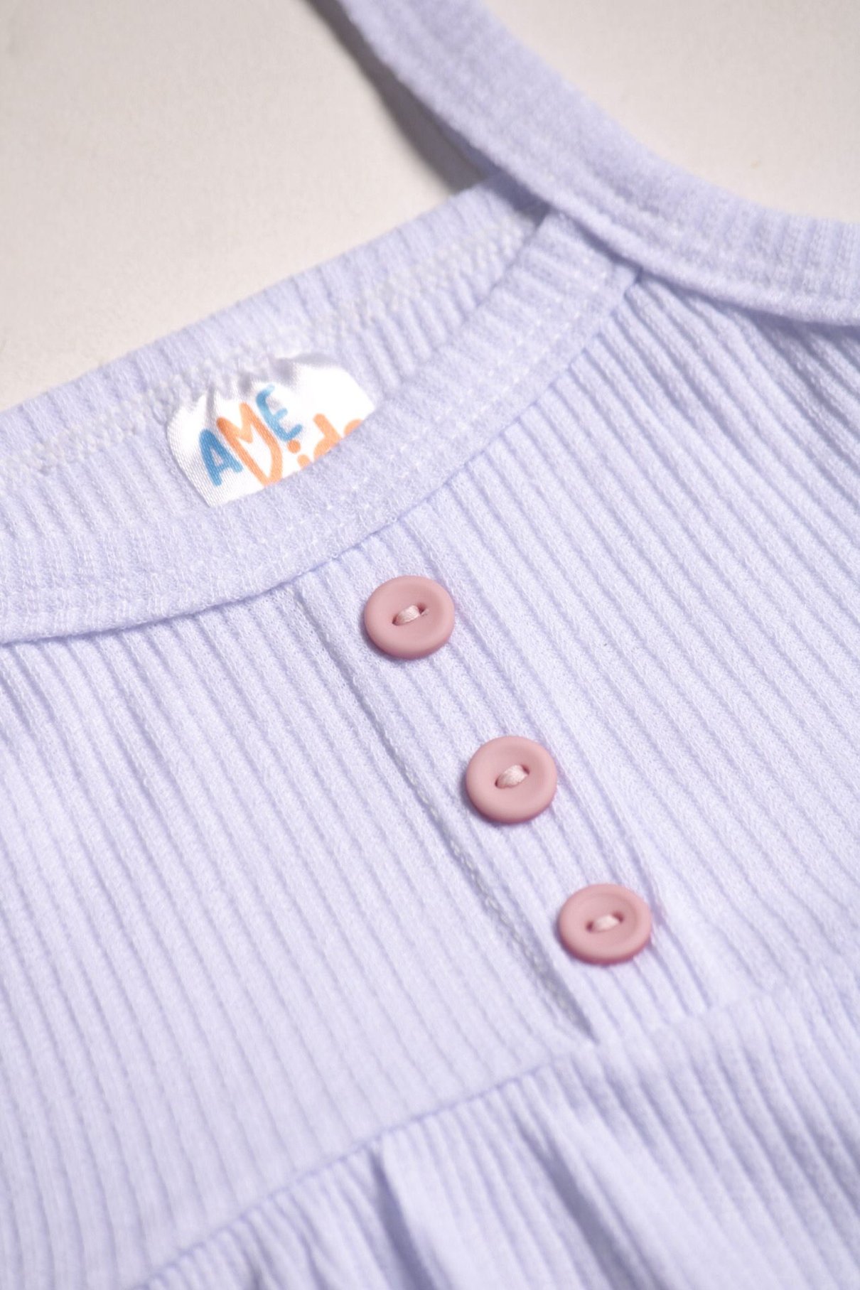 Detalhe: Bot&otilde;es na frente do Conjunto Bata e Shorts Bubble Ame Kids, cor Rosa Beb&ecirc;